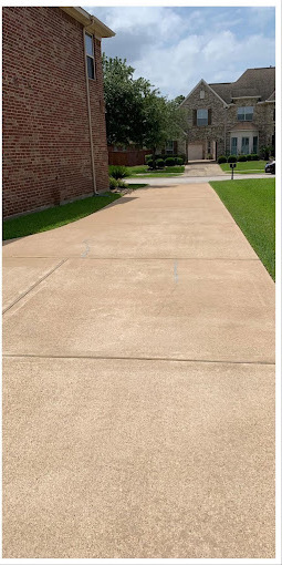 Same driveway after cleaning, concrete restored