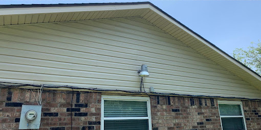 House siding after soft washing, clean and bright