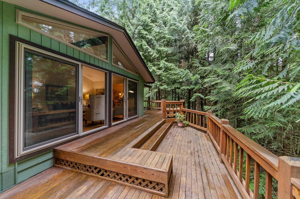 A residential wood deck cleaned and ready to seal